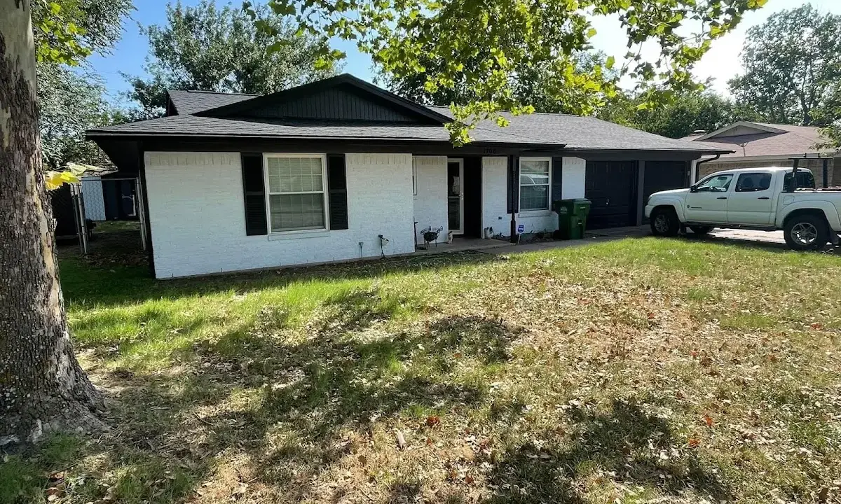 Professional roofing crew working on a residential roof in Mechanicville